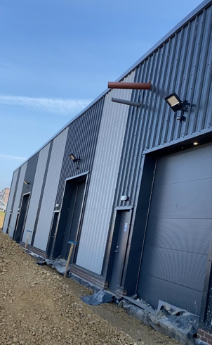 Exterior commercial floodlighting on industrial unit, Liverpool